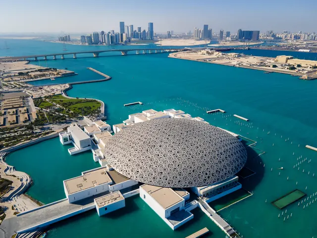 Aerial view of the Louvre Abu Dhabi dome on the waterfront
