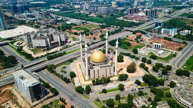 Abuja National Mosque with its golden dome and four minarets
