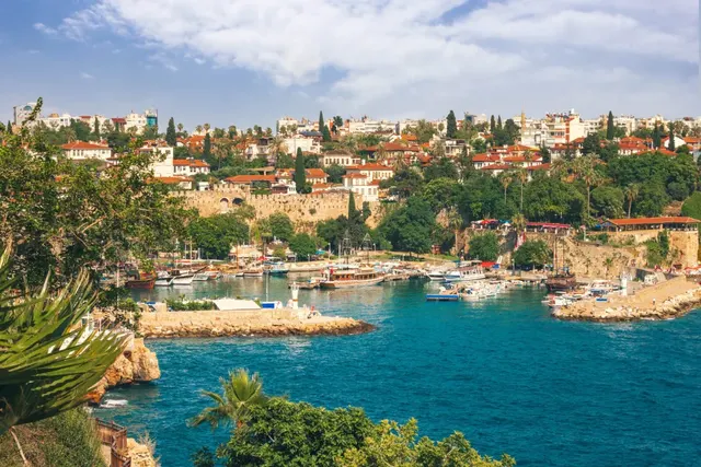 Kaleici old harbour and old town walls above Antalya's turquoise bay