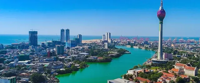 Colombo skyline with the Lotus Tower above Beira Lake, the port and the ocean