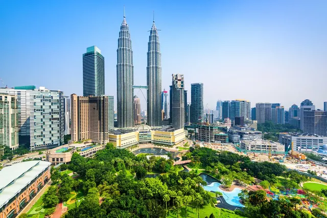 The Petronas Towers above Kuala Lumpur's city park