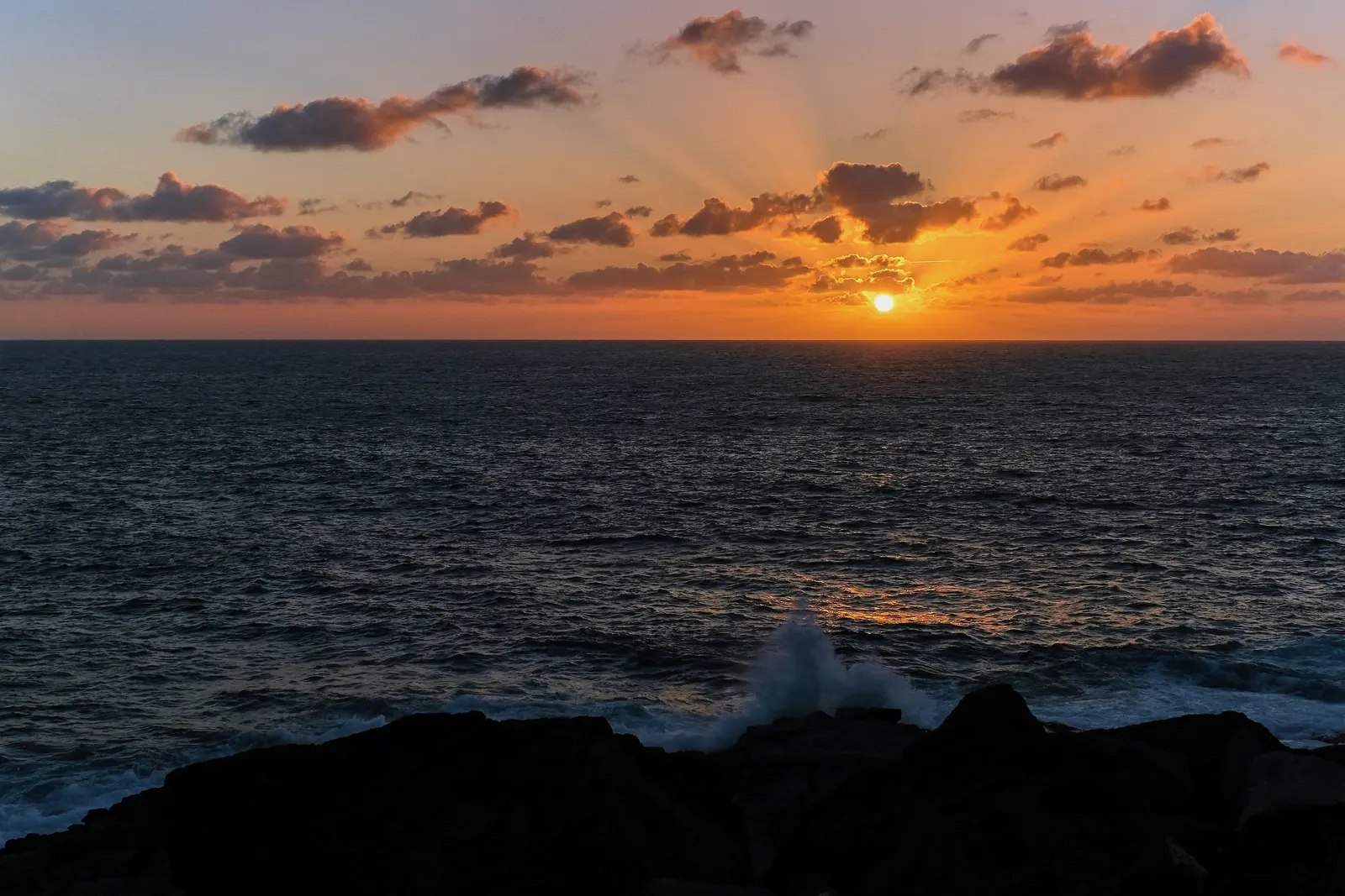 Atlantic sunset over Lanzarote's volcanic shoreline