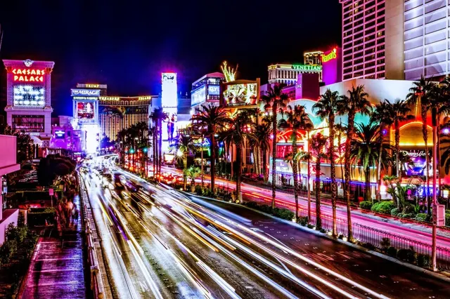 The Las Vegas Strip at night past Caesars Palace and the Mirage