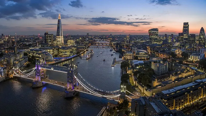 Tower Bridge and the London skyline at dusk