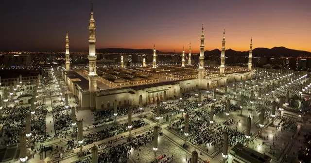 Al-Masjid an-Nabawi, the Prophet's Mosque in Medina, illuminated at dusk