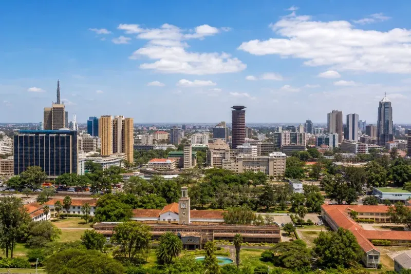 Nairobi skyline with the cylindrical KICC tower and the city clock tower