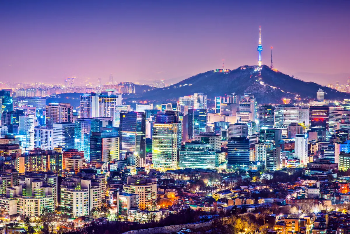 Seoul's neon-lit streets beneath N Seoul Tower