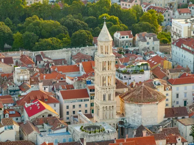 Bell tower of St Domnius rising above Diocletian's Palace rooftops, Split