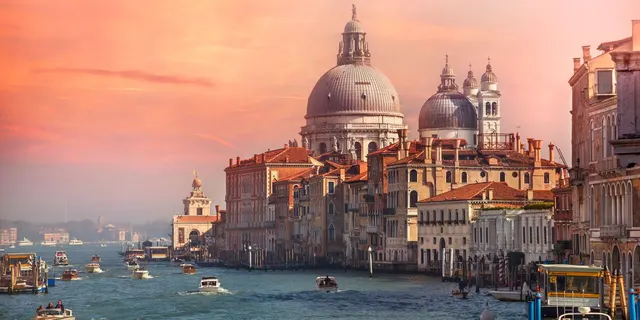 The Grand Canal and Salute basilica at sunset in Venice