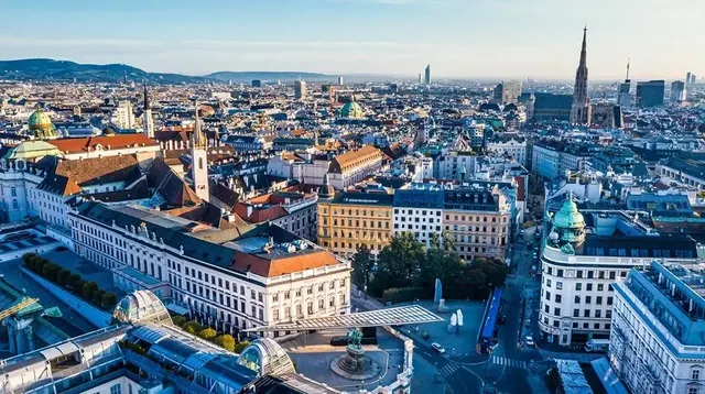 St Stephen's Cathedral spire above Vienna's imperial rooftops and the Hofburg dome